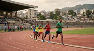 Ethiopian athletes running on a track at a stadium in Addis Ababa